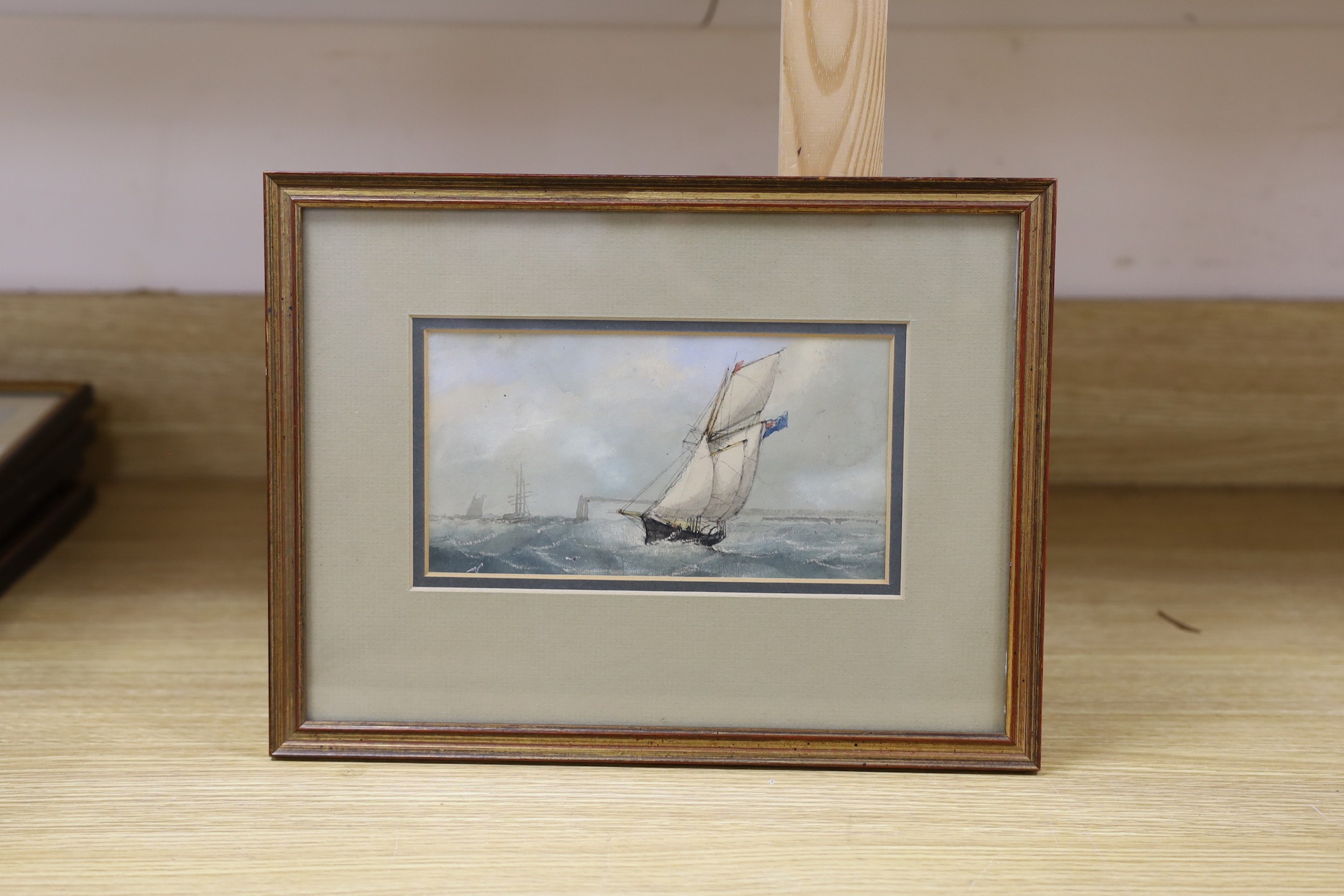W. Cluett, watercolour, Yacht with blue Ensign off Headland, 10 x 20cm
